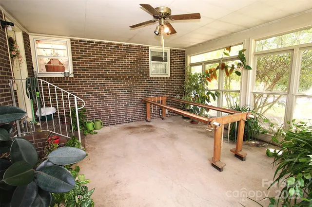 a view of a porch with seating space