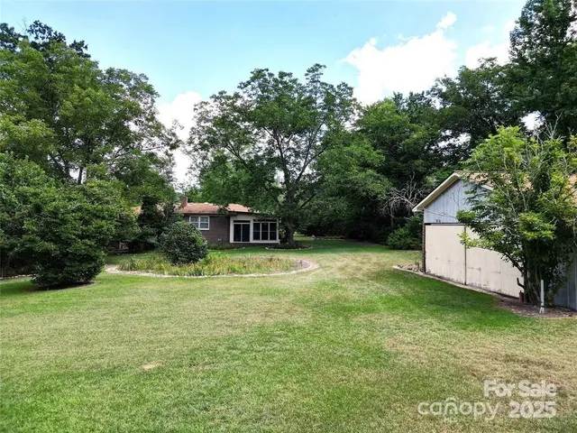 a fire hydrant in the middle of a field