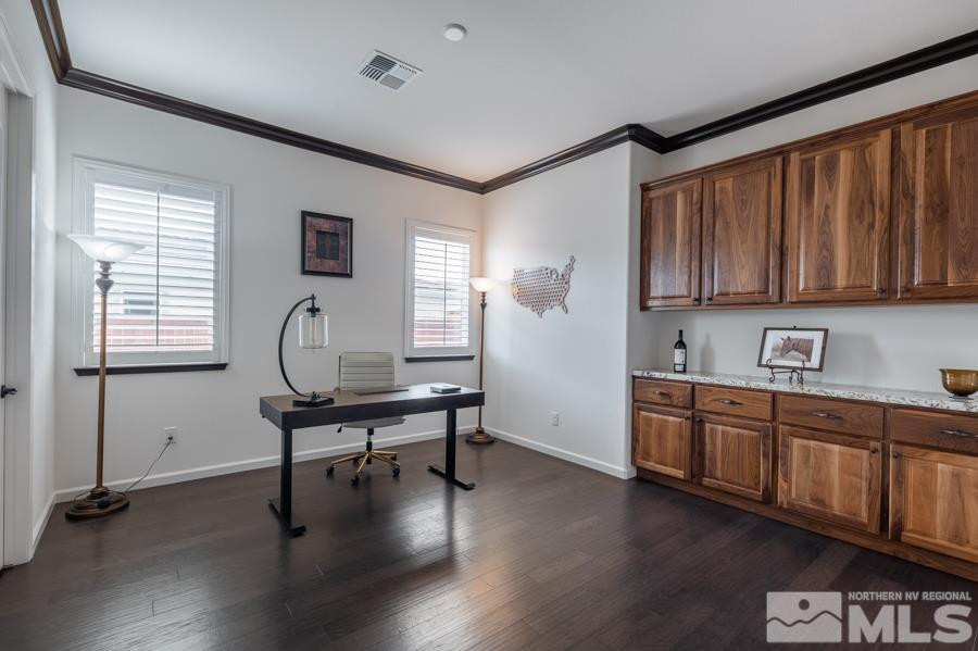 9898 Firefoot Lane Reno, NV 89521 - Photo 23 of 40 a kitchen with sink cabinets and wooden floor