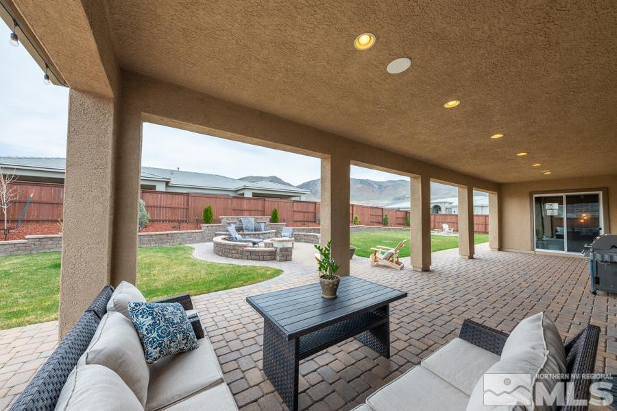 9898 Firefoot Lane Reno, NV 89521 - Photo 31 of 40 a living room with furniture and a large window