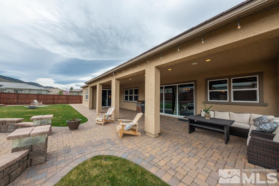 9898 Firefoot Lane Reno, NV 89521 - Photo 33 of 40 a house view with a sitting space garden view