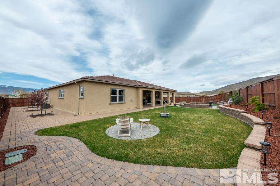9898 Firefoot Lane Reno, NV 89521 - Photo 36 of 40 a front view of a house with garden