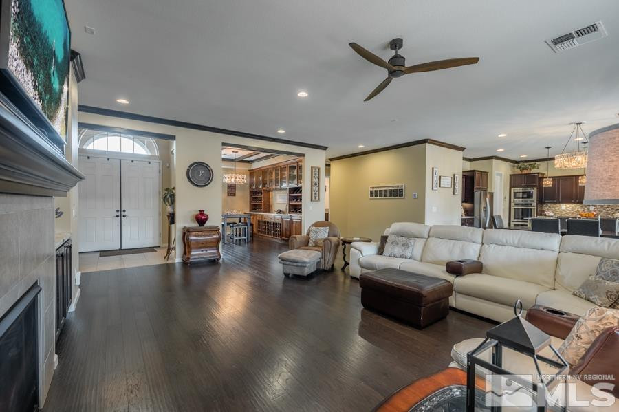 9898 Firefoot Lane Reno, NV 89521 - Photo 4 of 40 a living room with furniture and a large window