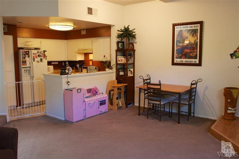 1742 Sinaloa Road, Unit 335 Simi Valley, CA 93065 - Photo 11 of 28 a view of a dining room with furniture