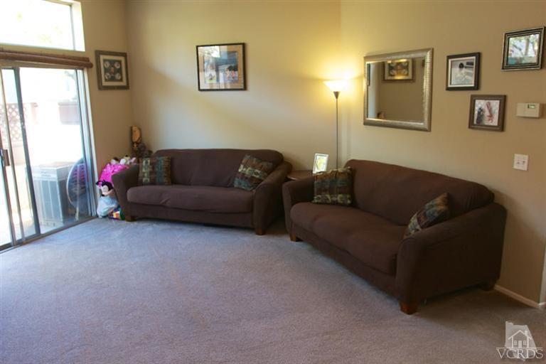 1742 Sinaloa Road, Unit 335 Simi Valley, CA 93065 - Photo 12 of 28 a living room with furniture and a window