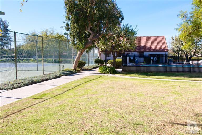 1742 Sinaloa Road, Unit 335 Simi Valley, CA 93065 - Photo 3 of 28 a view of swimming pool with palm trees