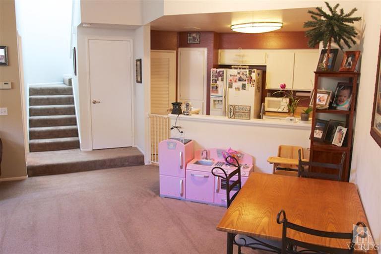 1742 Sinaloa Road, Unit 335 Simi Valley, CA 93065 - Photo 9 of 28 a room with furniture and a table