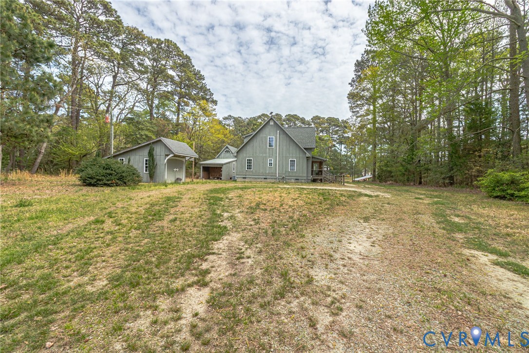 193 Deep Water Lane Reedville, VA 22539 - Photo 65 of 84 The property features a main dwelling and an outbu