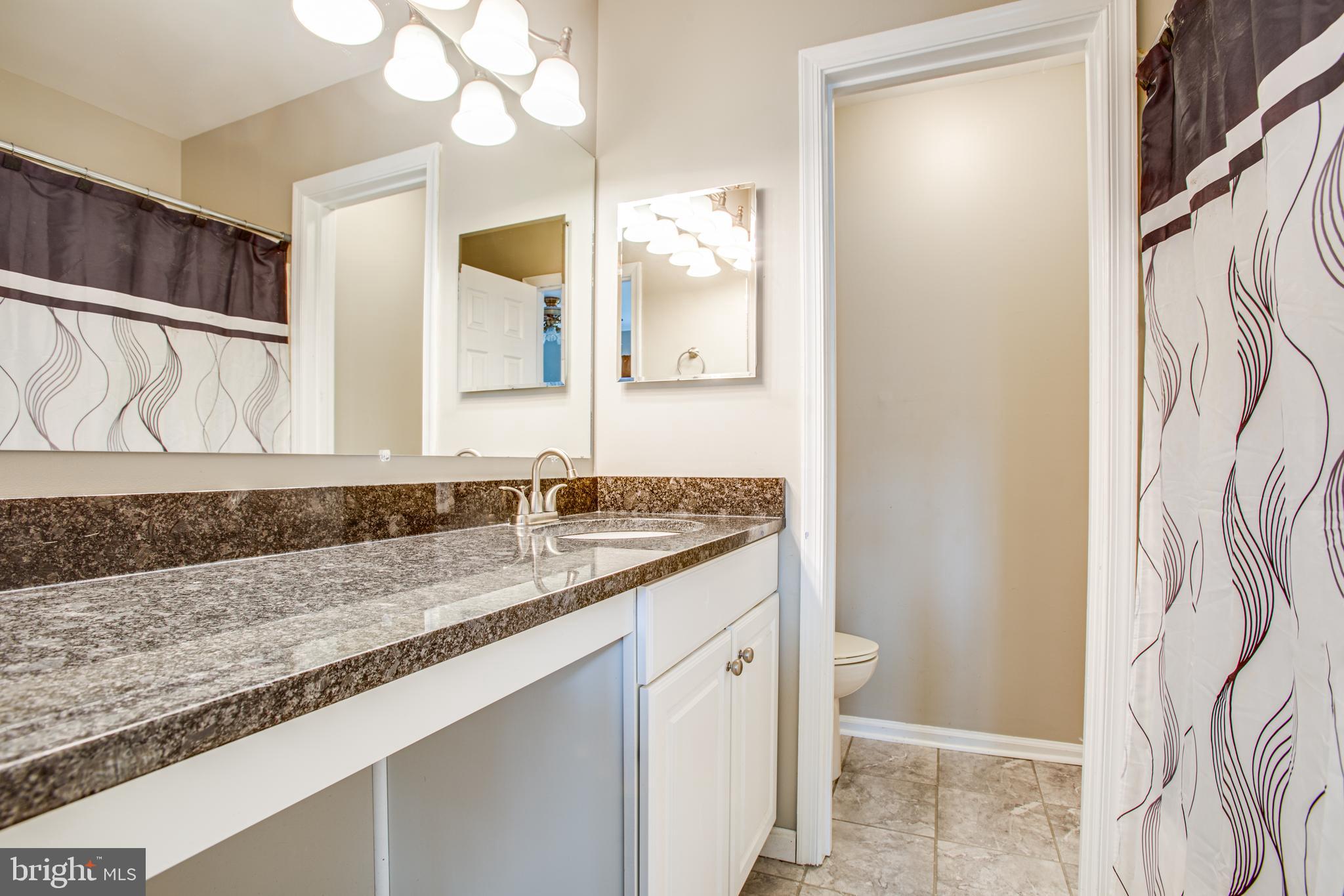 300 Windsor Ridge Court Fredericksburg, VA 22405 - Photo 11 of 35 Primary bathroom -tile flooring & granite