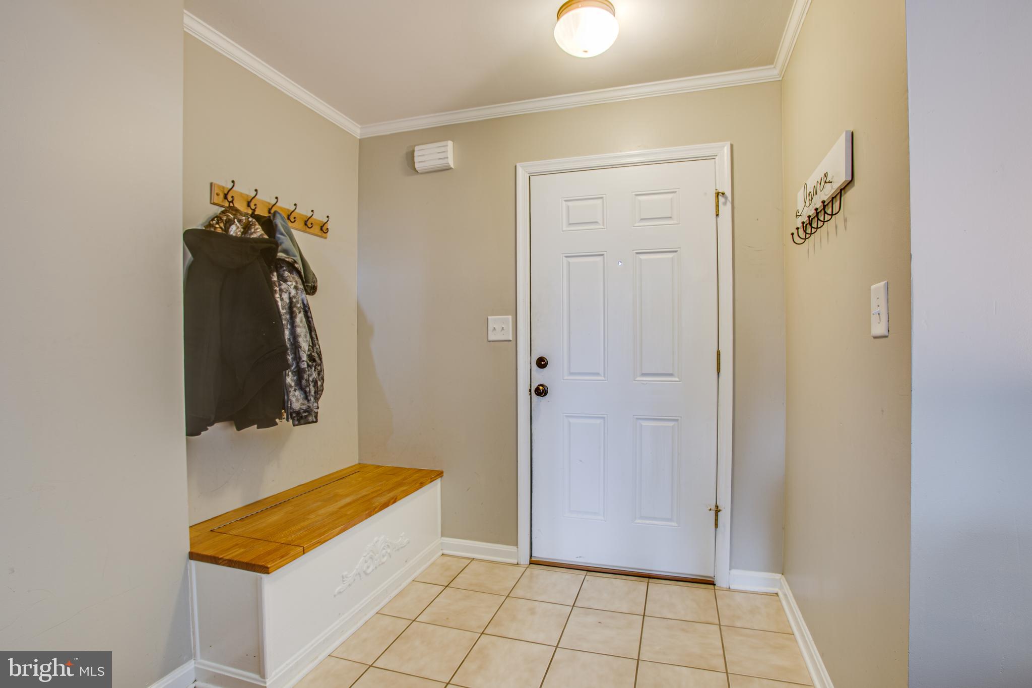 300 Windsor Ridge Court Fredericksburg, VA 22405 - Photo 17 of 35 Front entrance - tile & built-in storage bench