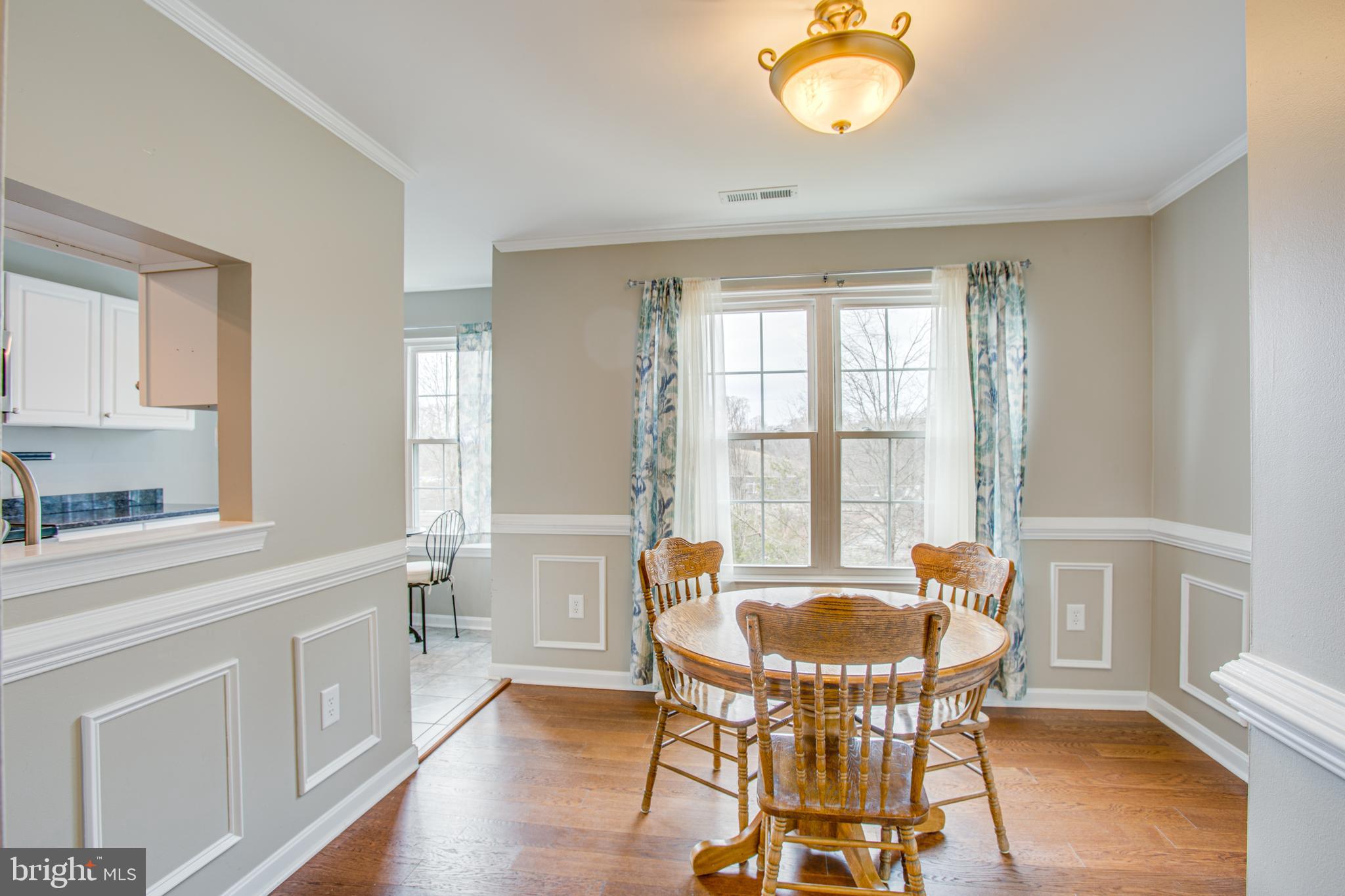 300 Windsor Ridge Court Fredericksburg, VA 22405 - Photo 5 of 35 Lovely moldings and wood flooring in the dining rm