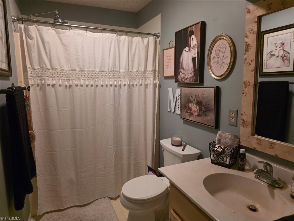 302 Spring Street Mount Airy, NC 27030 - Photo 10 of 17 Bathroom off Sitting Room and Kitchen