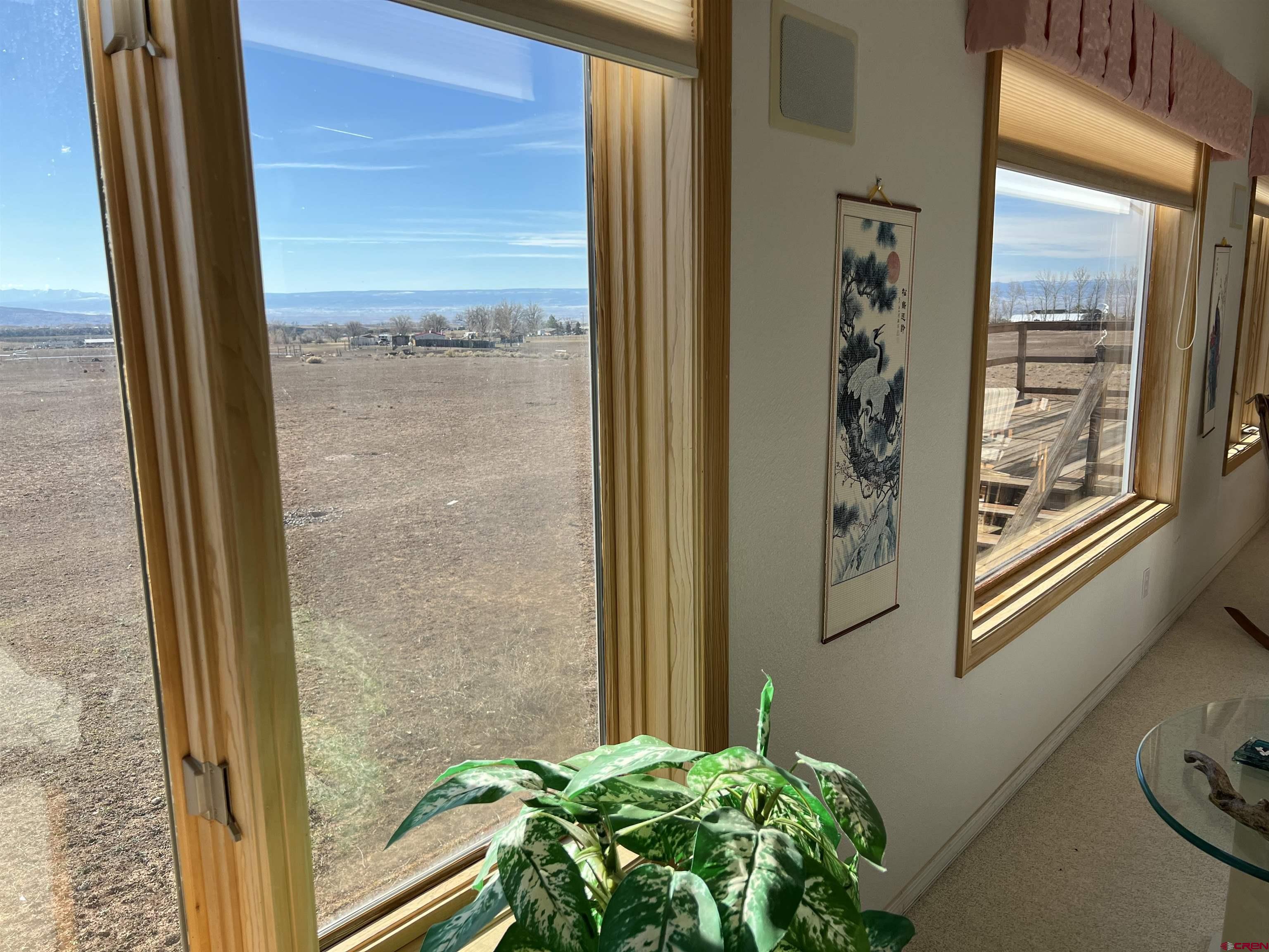26096 Paintbrush Road Cedaredge, CO 81413 - Photo 9 of 29 a view of a balcony