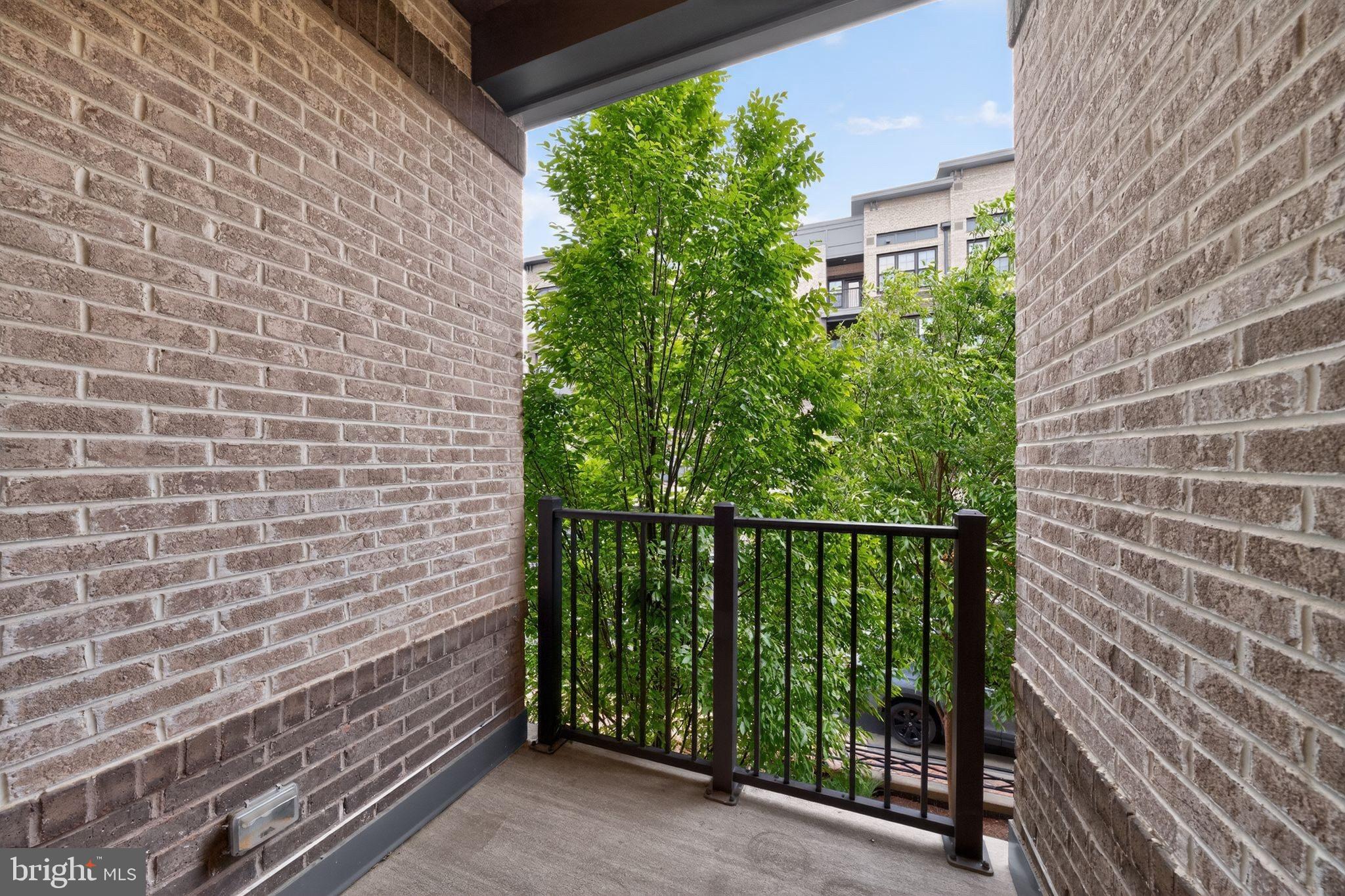 2319 Field Point Road, Unit 102 Herndon, VA 20171 - Photo 11 of 20 a view of a balcony with an outdoor space