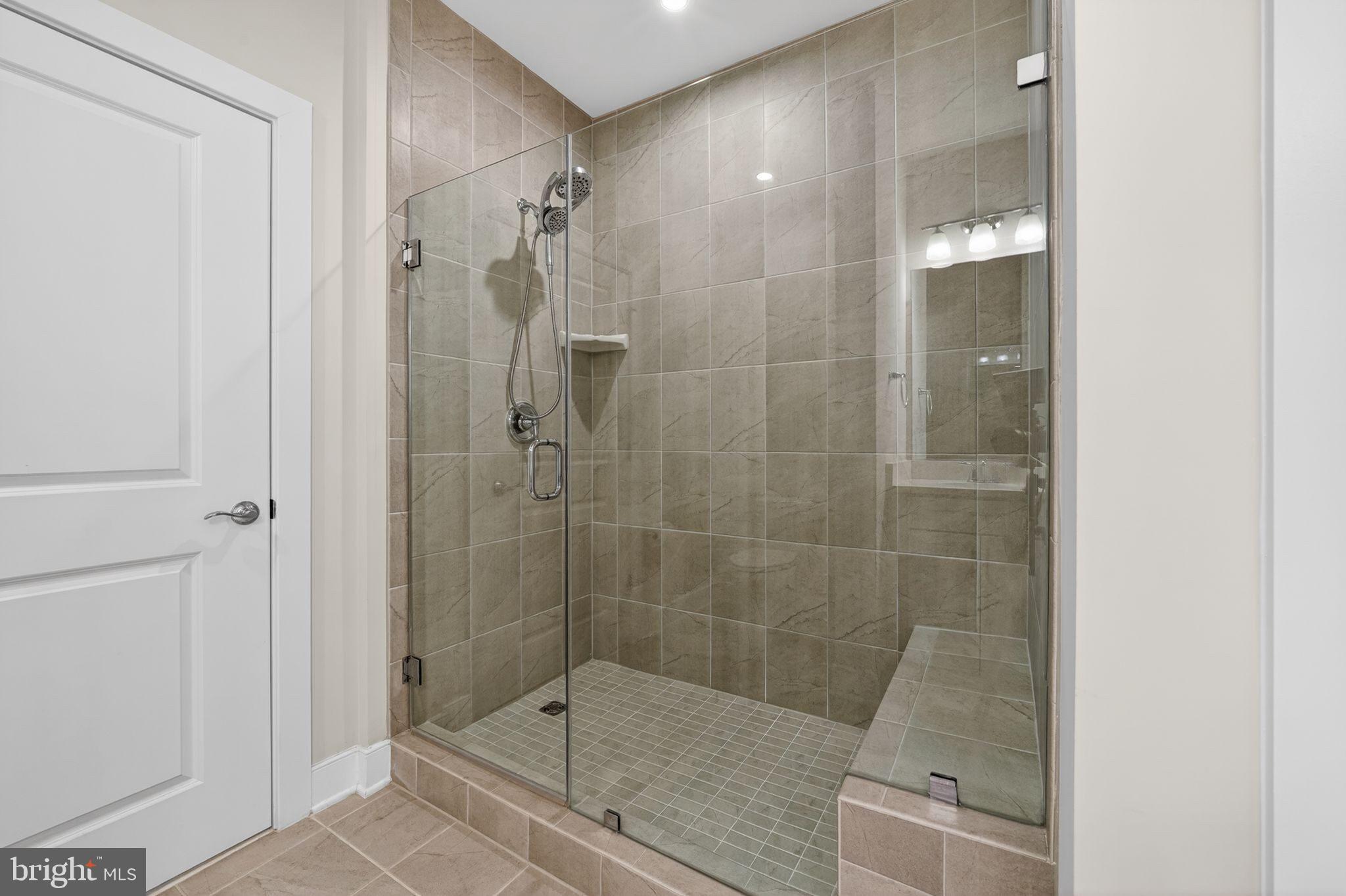 2319 Field Point Road, Unit 102 Herndon, VA 20171 - Photo 14 of 20 a bathroom with a shower