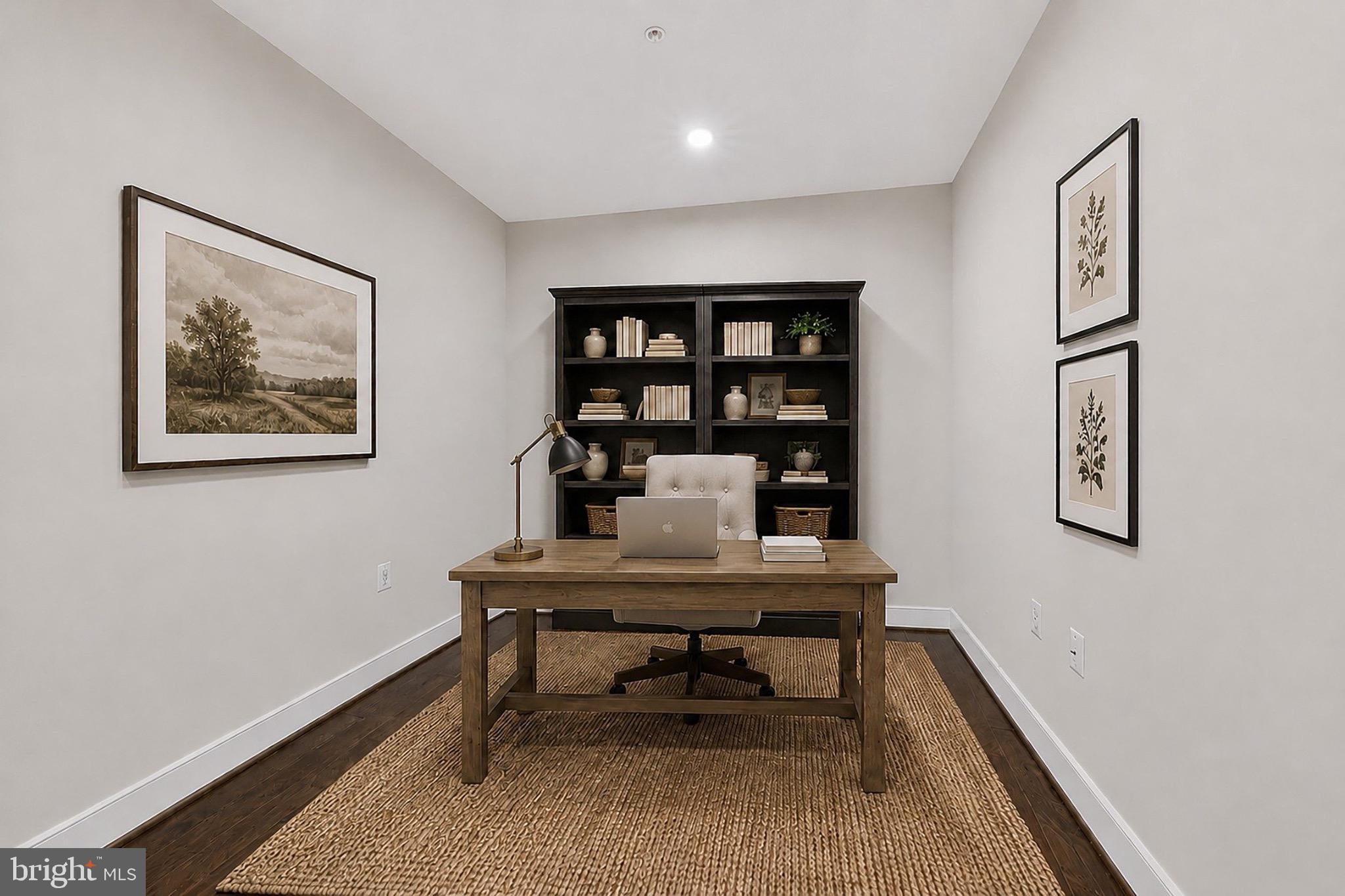 2319 Field Point Road, Unit 102 Herndon, VA 20171 - Photo 5 of 20 a view of a workspace with furniture