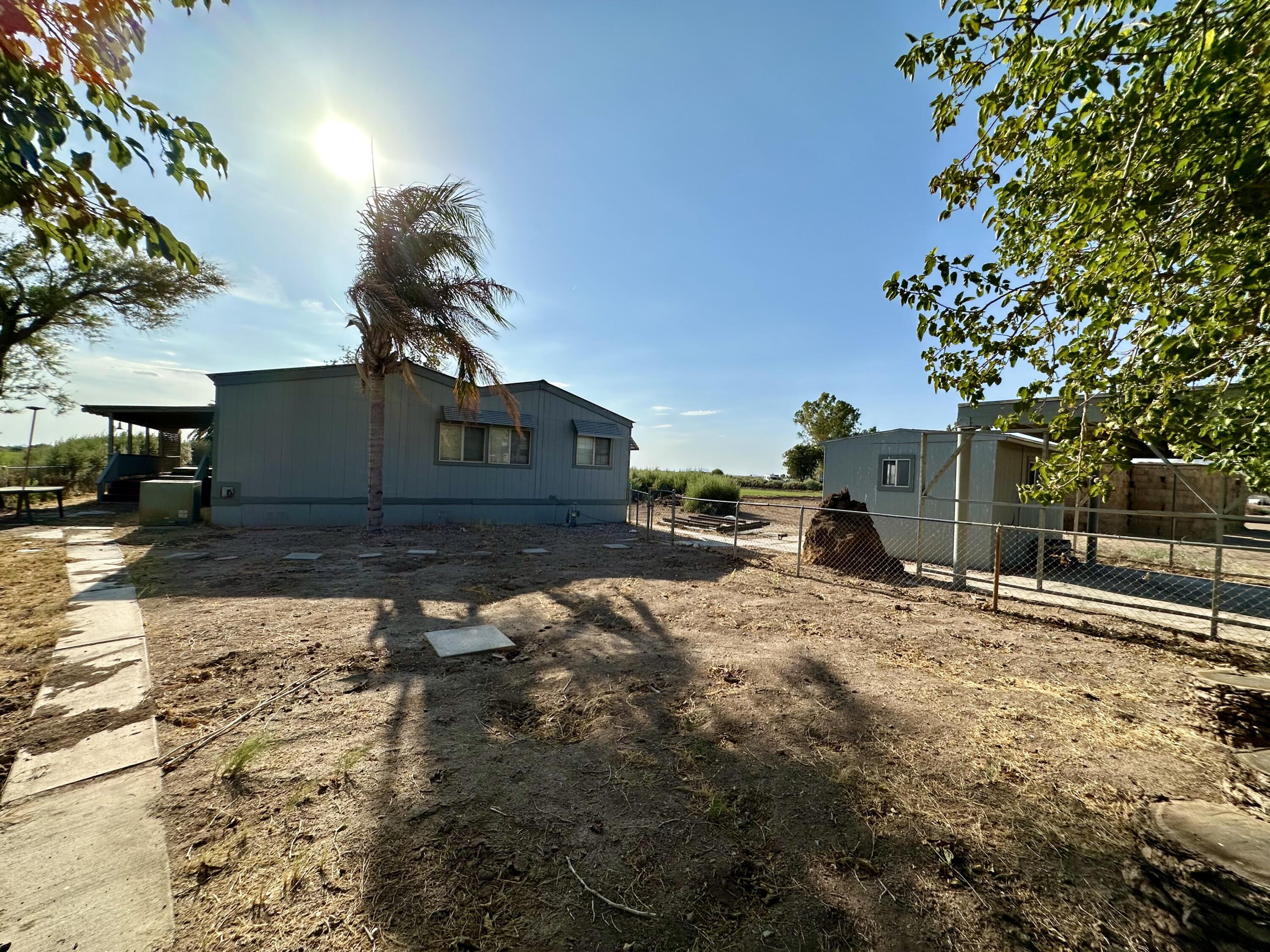 5261 North Intake Boulevard Blythe, CA 92225 - Photo 1 of 14 a view of a house with a yard