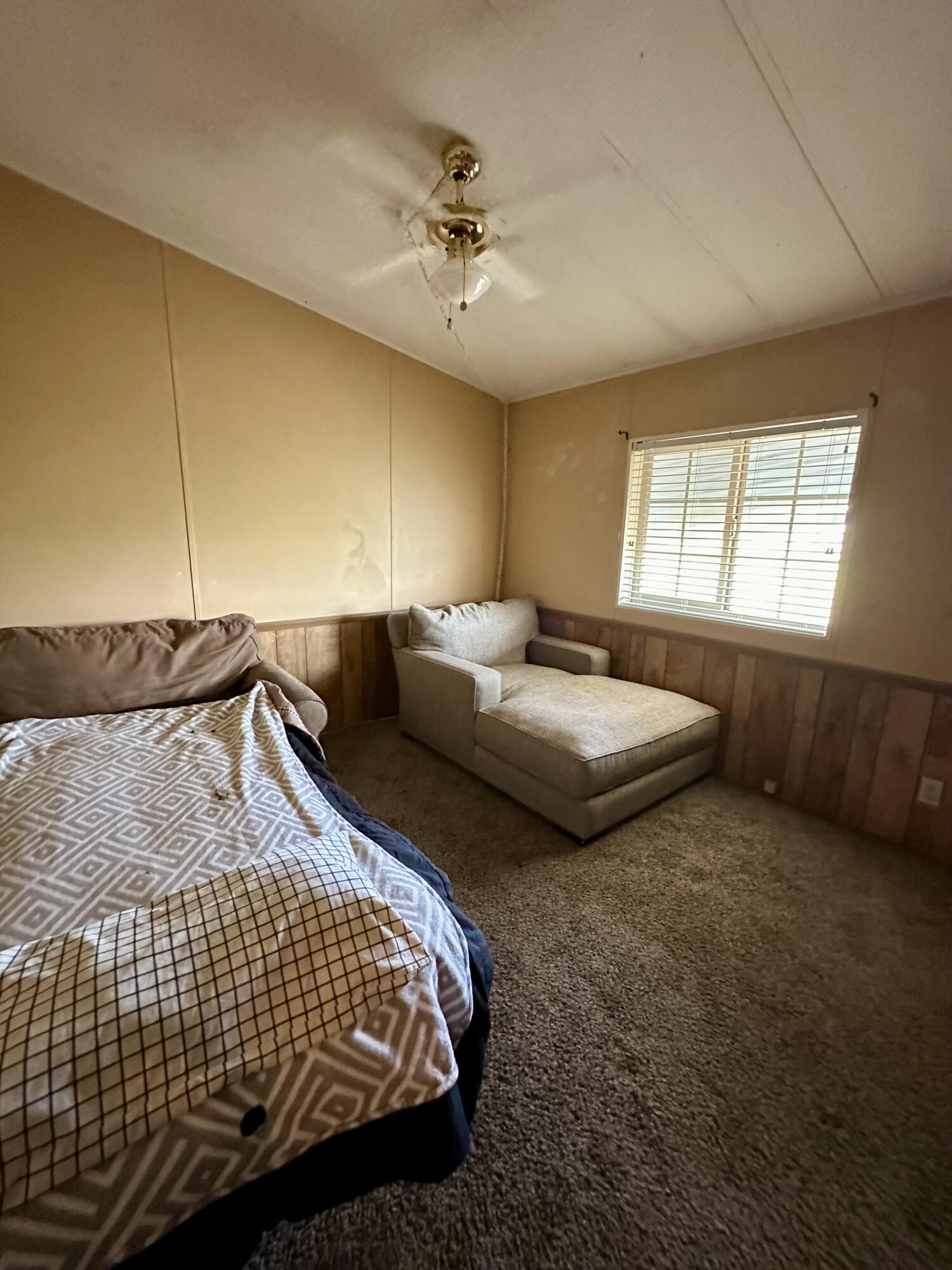 5261 North Intake Boulevard Blythe, CA 92225 - Photo 13 of 14 a bedroom with bed and window