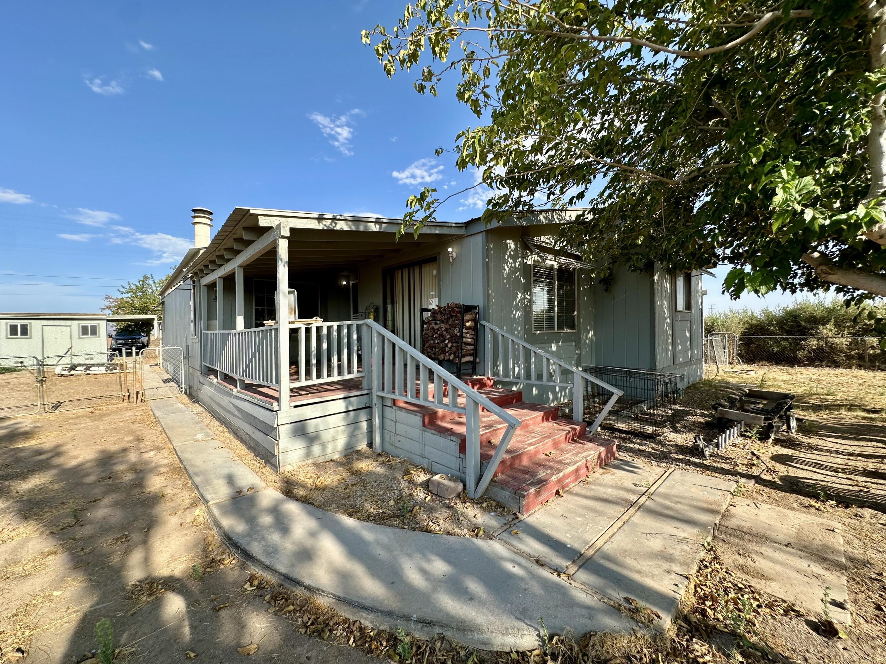 5261 North Intake Boulevard Blythe, CA 92225 - Photo 2 of 14 a view of house with swimming pool and sitting area