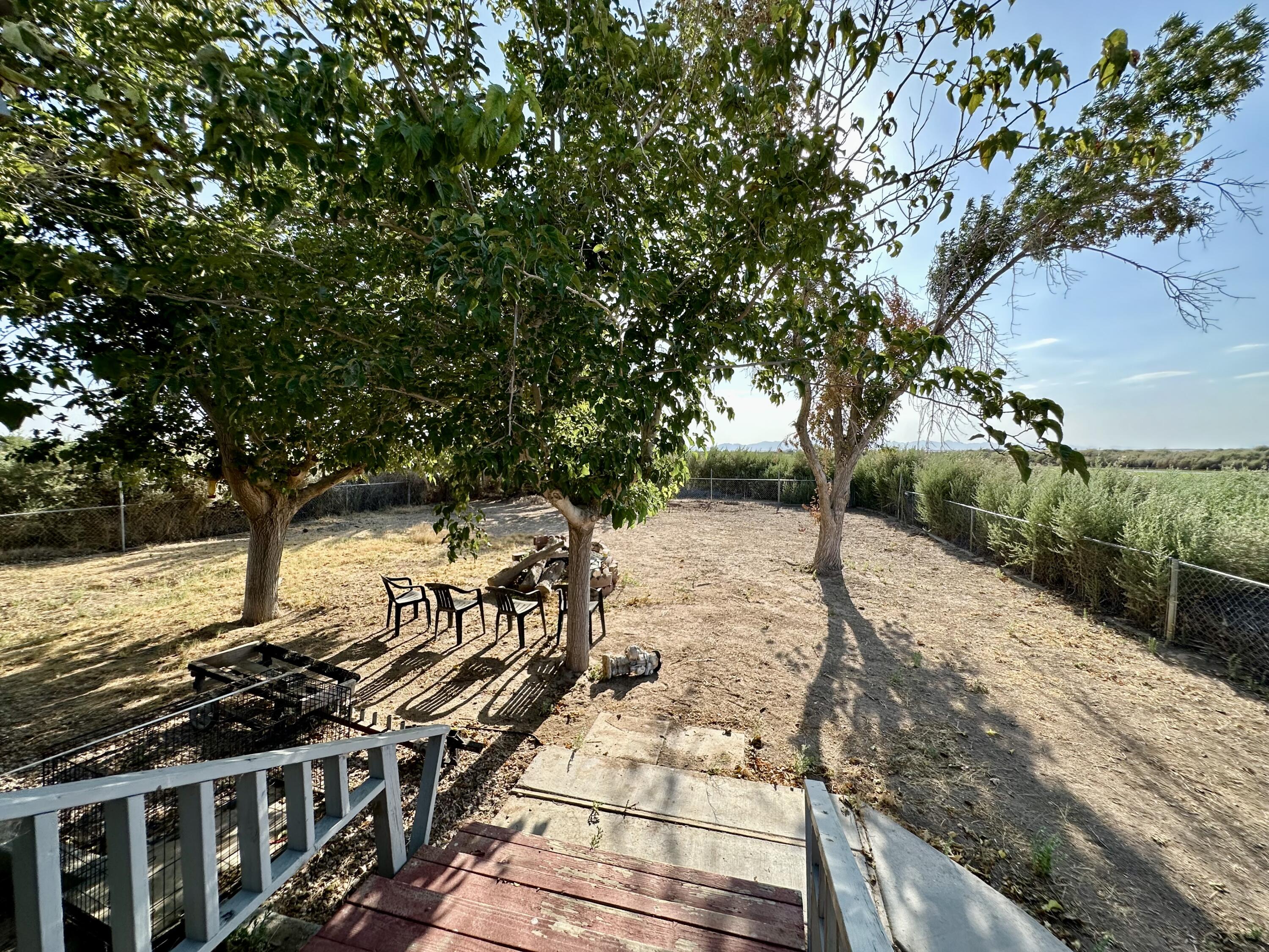 5261 North Intake Boulevard Blythe, CA 92225 - Photo 4 of 14 a view of a yard with wooden fence