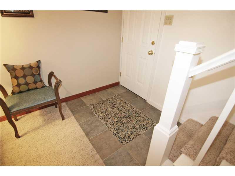 877 Bebout Road Venetia, PA 15367 - Photo 22 of 25 Basement/Game Room. The entry floor from the garage has been updated with a stylish stone and tile surface...