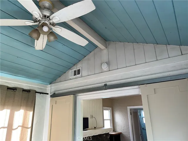 a view of a livingroom with a ceiling fan