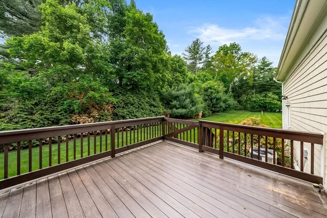 a view of balcony with wooden floor