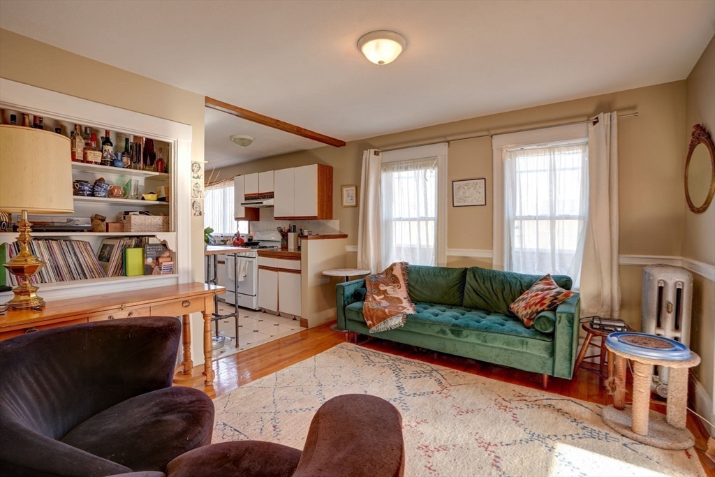 77 2nd Street, Unit 2 Medford, MA 02155 - Photo 9 of 18 a living room with furniture and a window