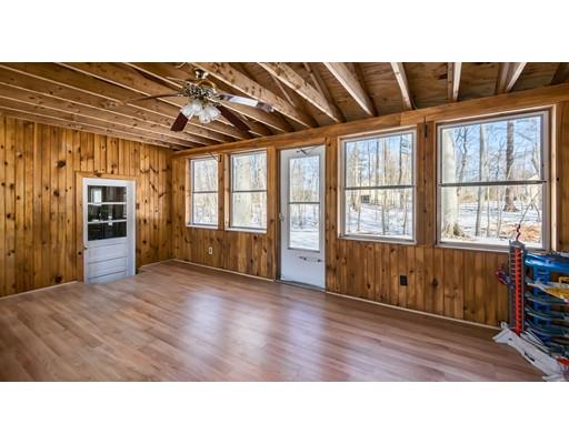 72 Ortins Road Hamilton, MA 01982 - Photo 18 of 30 a open hall with wooden floor and windows