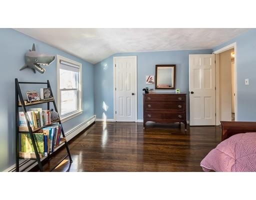 72 Ortins Road Hamilton, MA 01982 - Photo 27 of 30 a living room with furniture and a flat screen tv