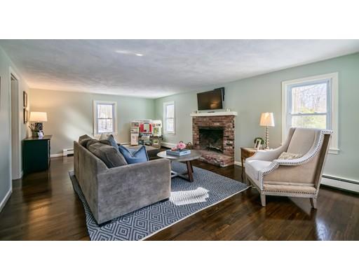72 Ortins Road Hamilton, MA 01982 - Photo 8 of 30 a living room with furniture and a fireplace