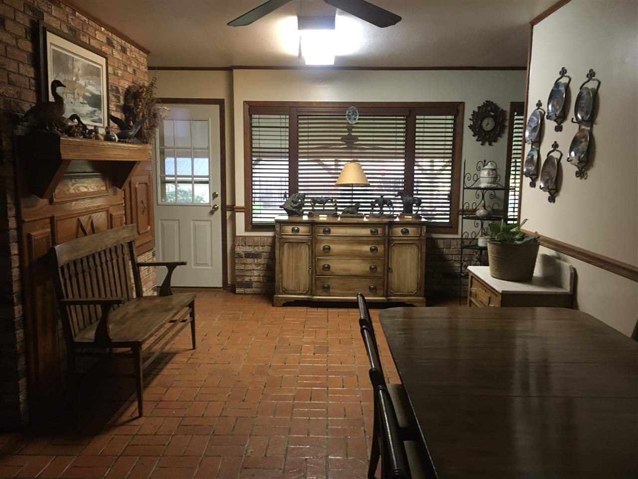 20 Butler Lane Collins, MS 39428 - Photo 5 of 25 Brick floors