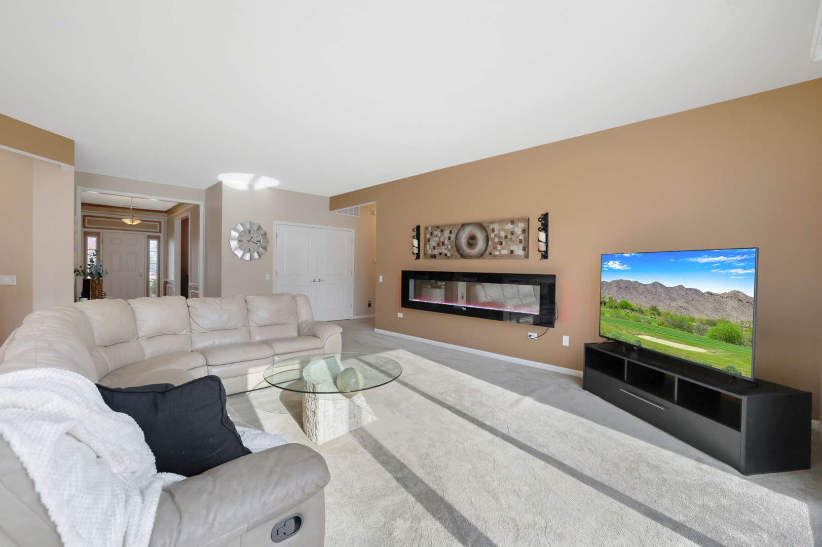 13767 Guilford Road Huntley, IL 60142 - Photo 15 of 34 a living room with furniture and a flat screen tv