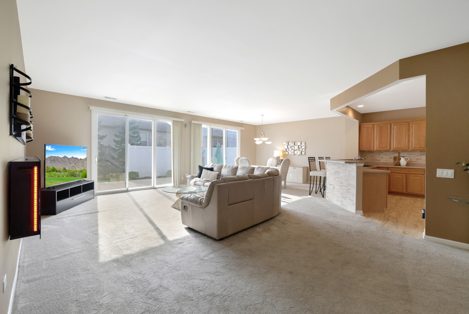 13767 Guilford Road Huntley, IL 60142 - Photo 16 of 34 a living room with furniture and a flat screen tv
