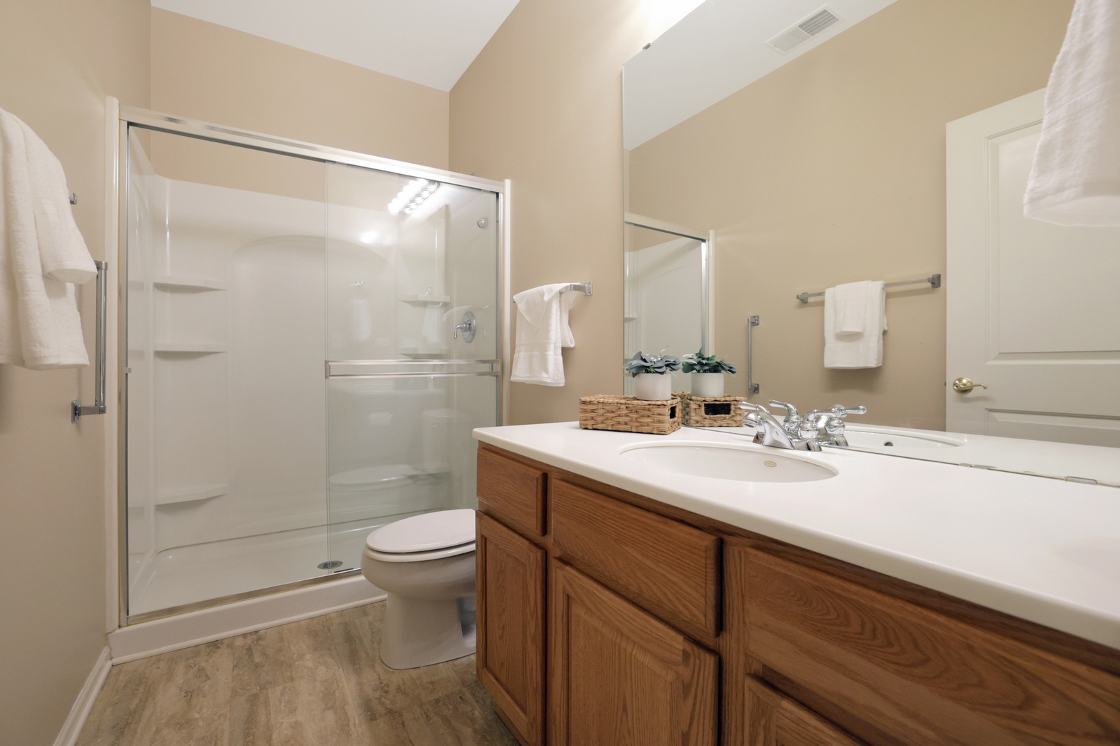 13767 Guilford Road Huntley, IL 60142 - Photo 28 of 34 a bathroom with a sink a toilet and shower