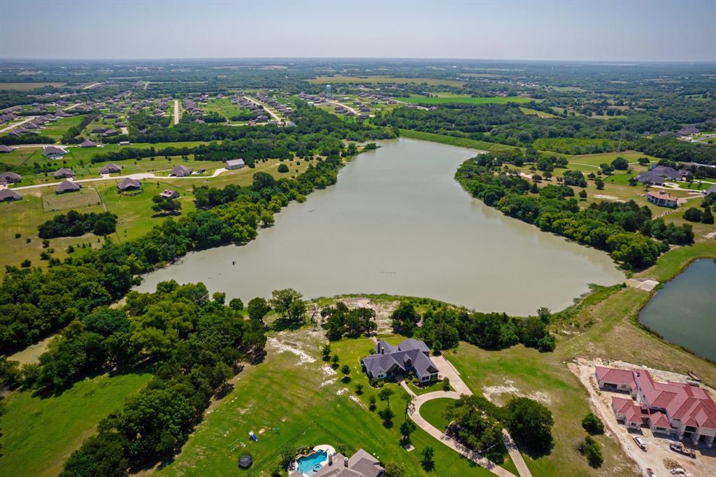 Tbd Lake Ridge Lane McKinney, TX 75071 - Photo 19 of 27 an aerial view of a city with lots of residential buildings ocean and mountain view in back