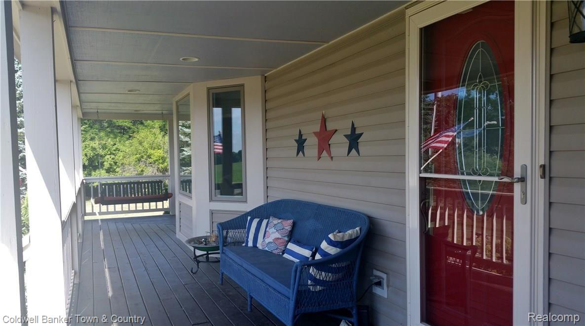 10770 Chase Lake Road Fowlerville, MI 48836 - Photo 7 of 43 ExteriorPorch6.jpg