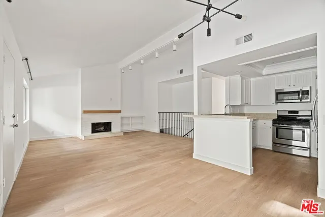 a view of kitchen and microwave