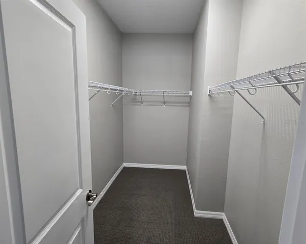 an empty room with closet