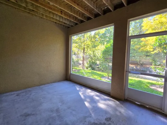 a view of backyard with green space
