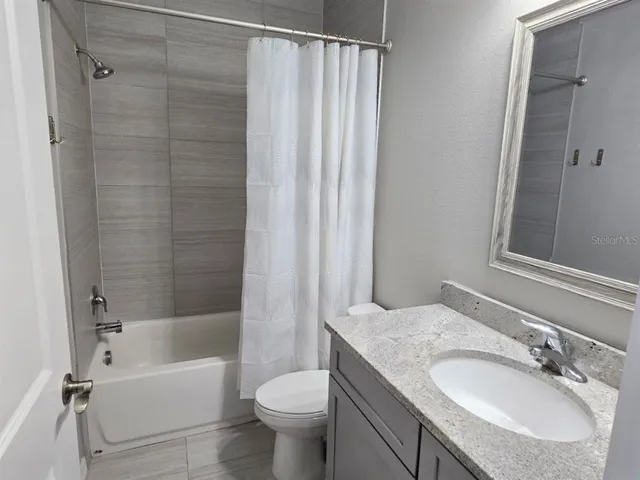 a view of a yard with furniture