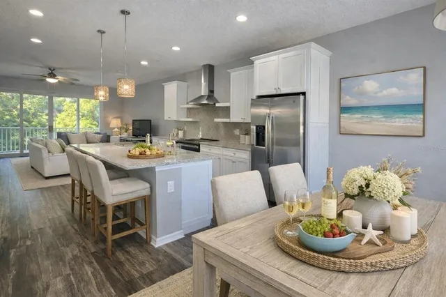 a view of livingroom and kitchen with hardwood floor
