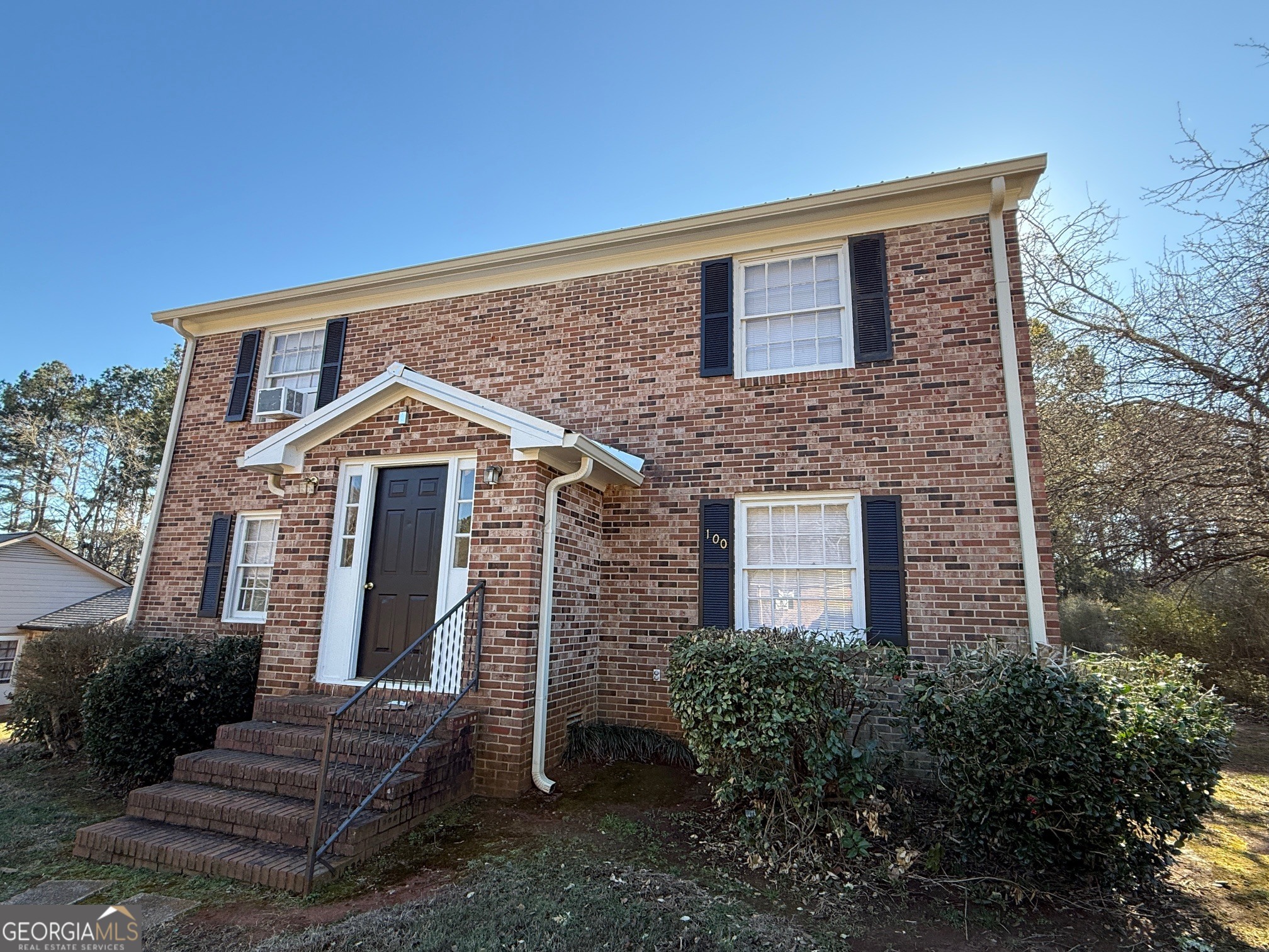 100 Citation Court Athens, GA 30605 - Photo 1 of 13 a front view of a house with garden