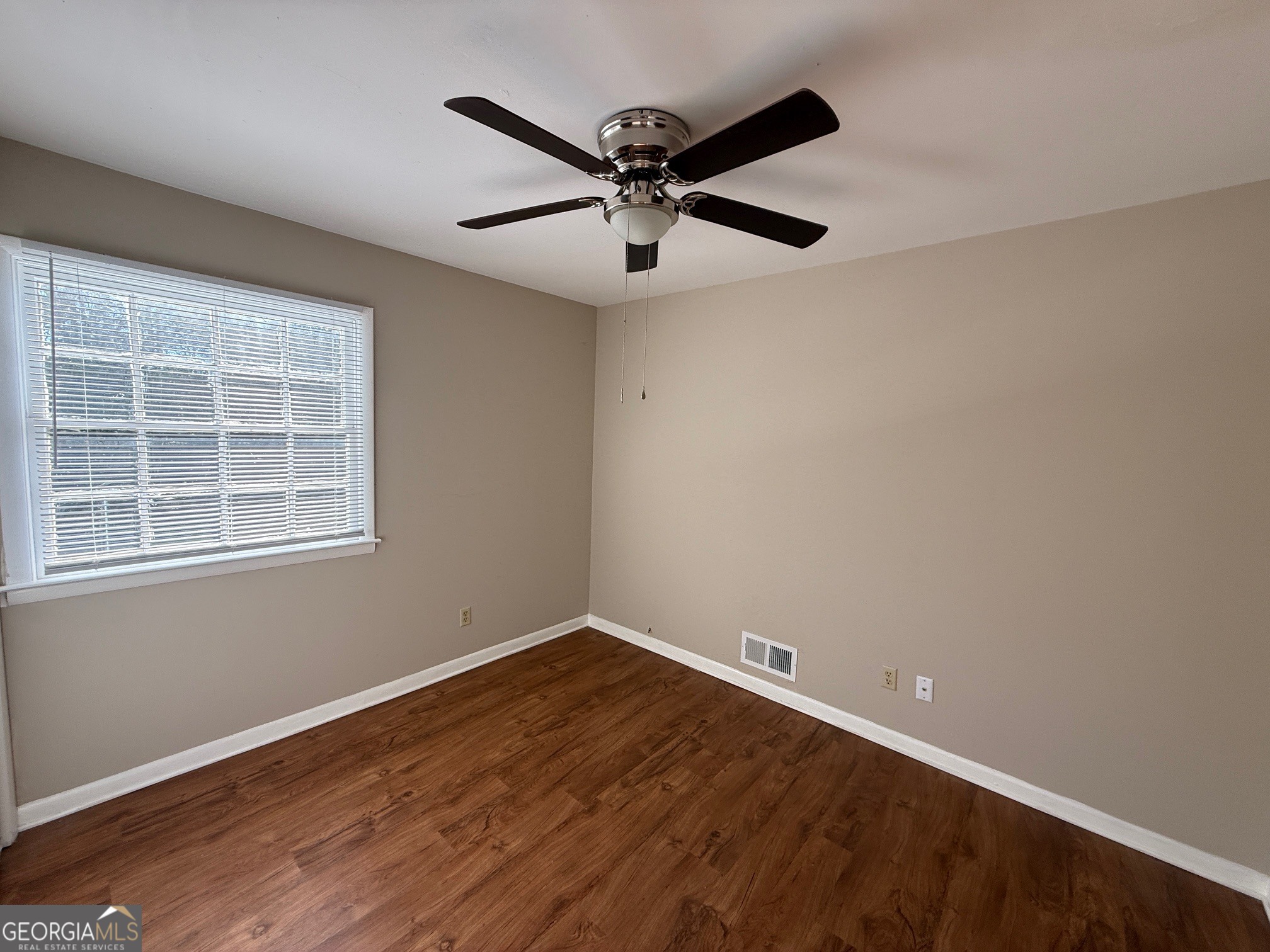 100 Citation Court Athens, GA 30605 - Photo 6 of 13 wooden floor in an empty room with a window
