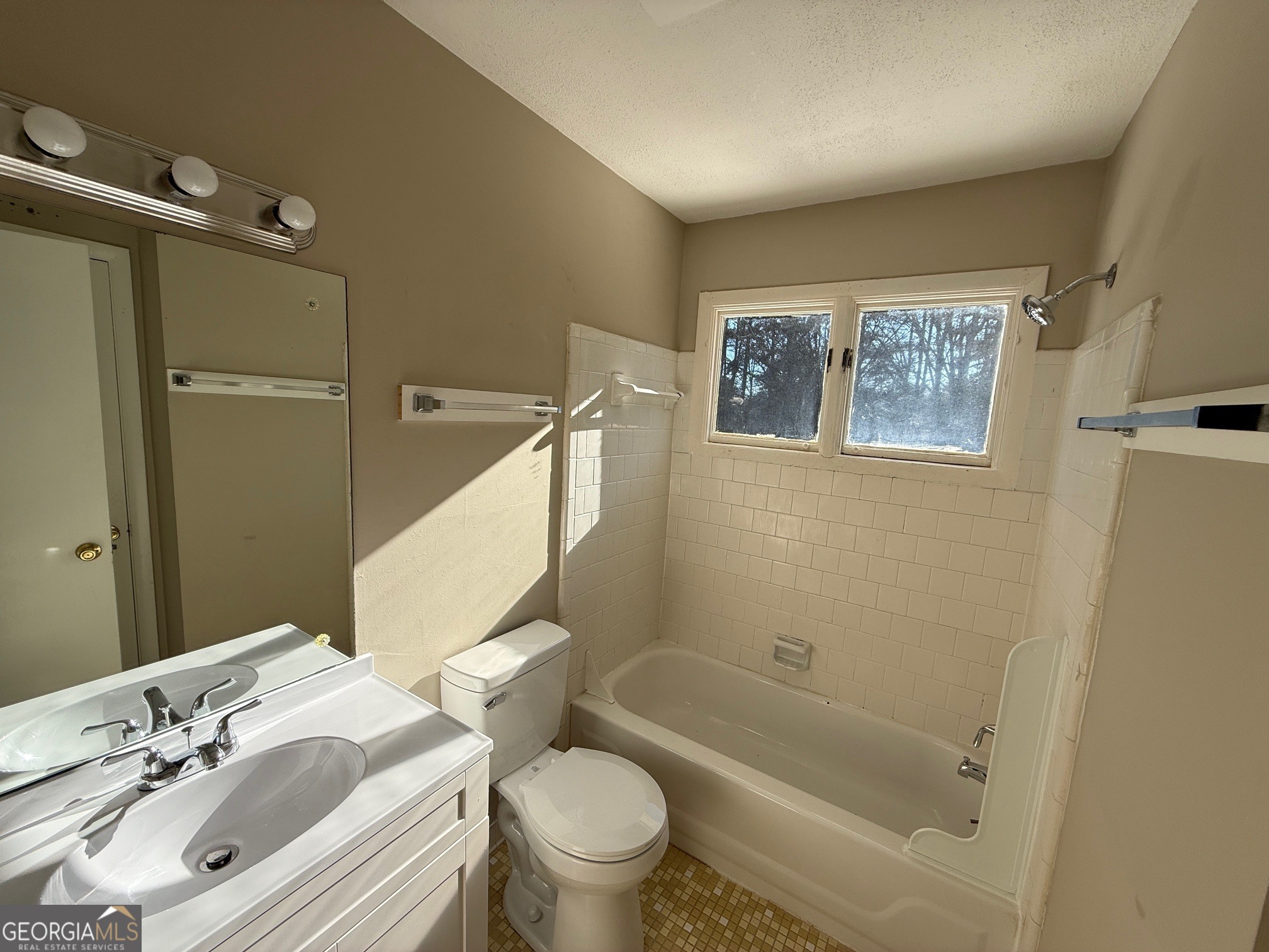 100 Citation Court Athens, GA 30605 - Photo 8 of 13 a bathroom with a sink a toilet and shower