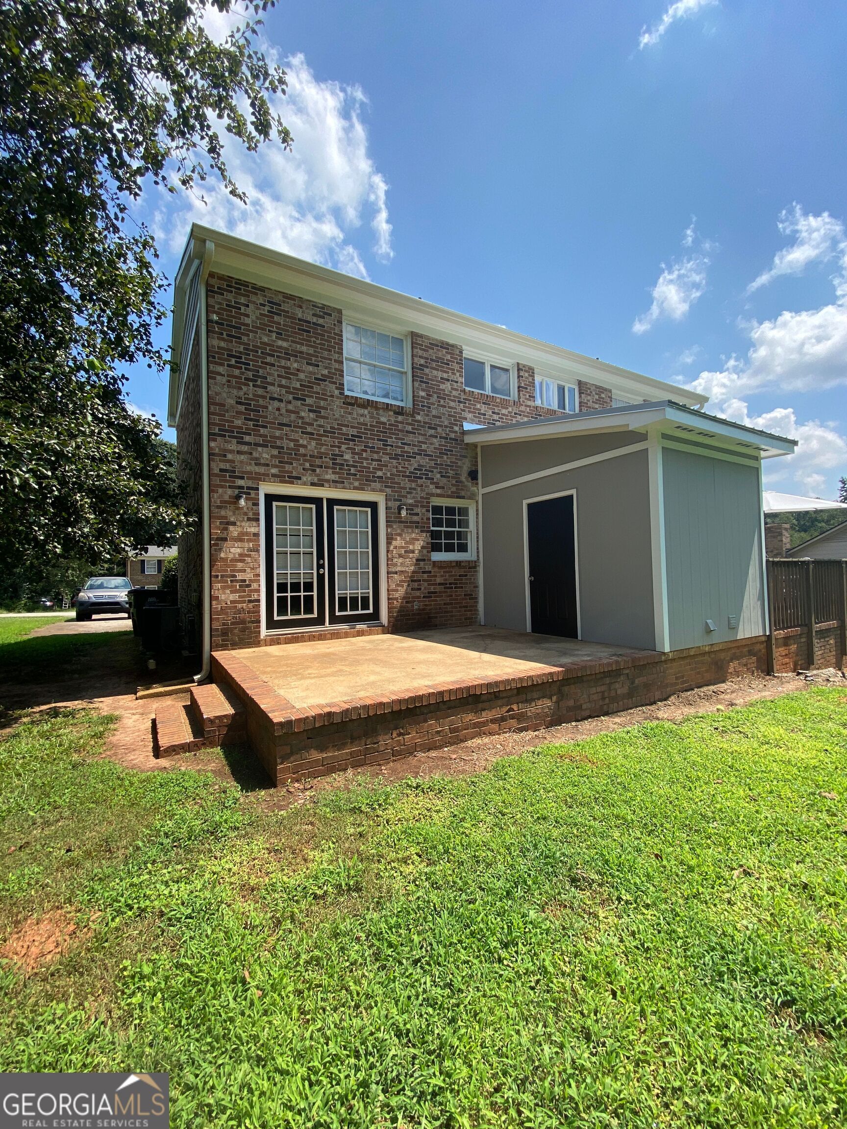 100 Citation Court Athens, GA 30605 - Photo 10 of 13 a view of a house with a yard and a patio