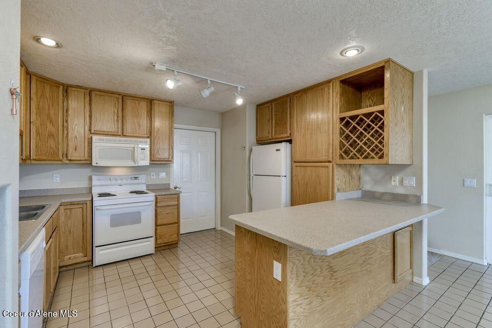 13947 Lauren Loop Rathdrum, ID 83858 - Photo 15 of 22 Kitchen B