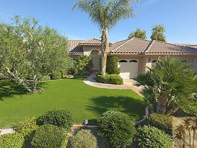 5 White Sun Way Rancho Mirage, CA 92270 - Photo 1 of 24 a front view of a house with garden