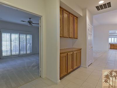 5 White Sun Way Rancho Mirage, CA 92270 - Photo 12 of 24 an entryway with a cabinet and a sink