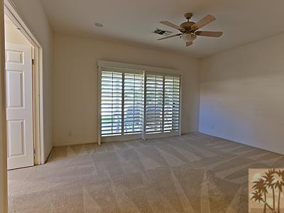 5 White Sun Way Rancho Mirage, CA 92270 - Photo 14 of 24 a view of an empty room with a window